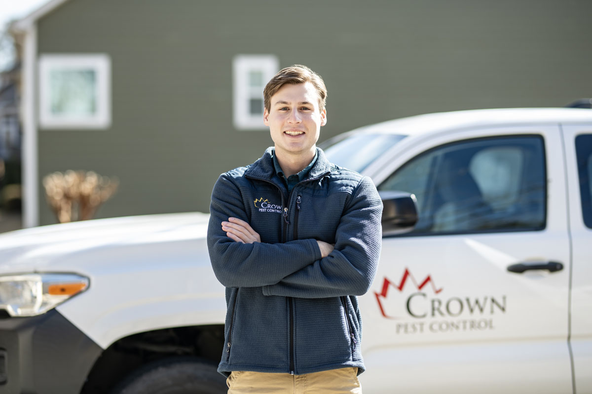 a man standing in front of a white truck Termite treatments near me